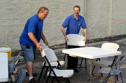 Ron Beigler and Charlie Miller movin' chairs